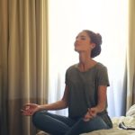 Meditation Cushion - Woman Meditating In Bedroom