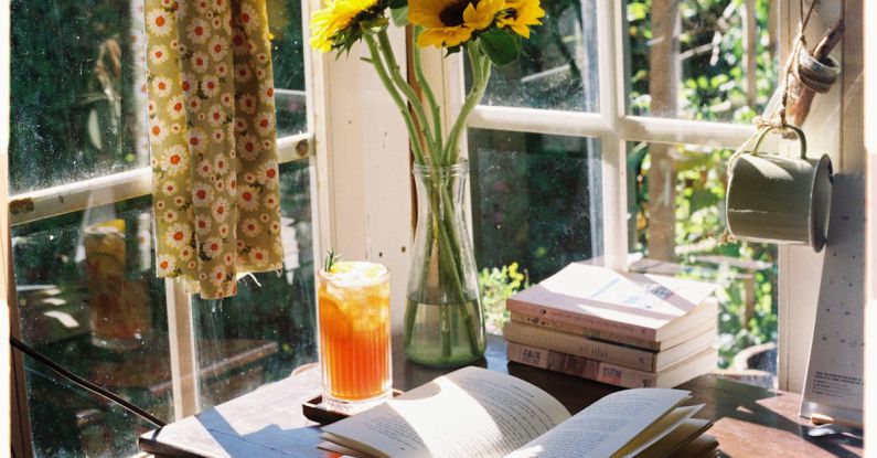 Opened Book - Opened Book by Sunflowers in Glass Vase in Home