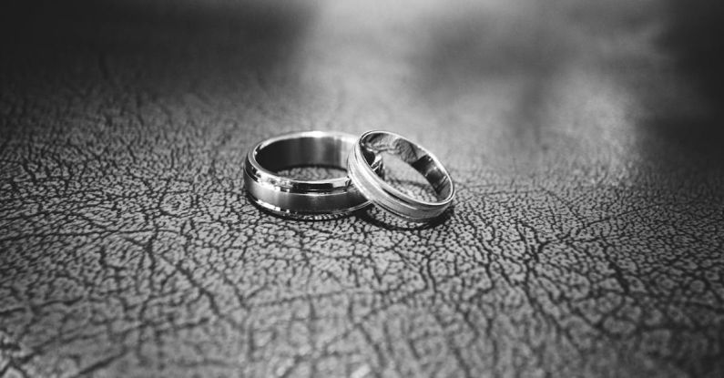 Wedding Rings - Close-up of Wedding Rings on Floor