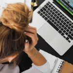 Work Life Balance - Woman Sitting in Front of Macbook