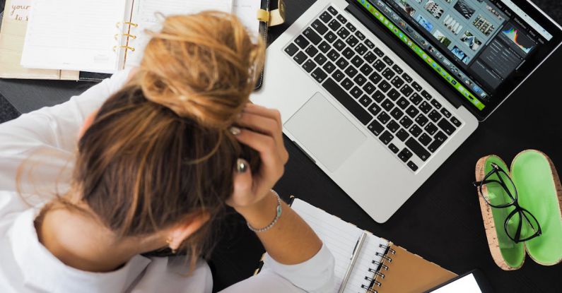 Work Life Balance - Woman Sitting in Front of Macbook