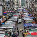 Market Bargaining - Vendors Stalls in a Street Market in Hong Kong