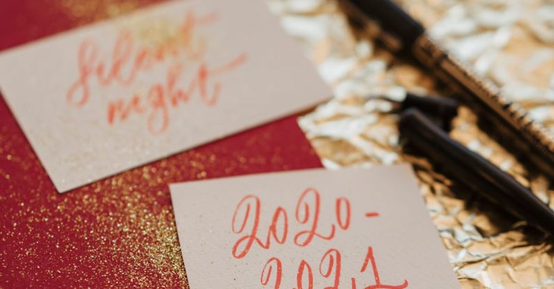 Calligraphy Pen - Gold Glitters Scattered on a Red Book