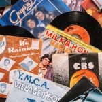 Gadgets Collection - Set of retro vinyl records on table