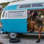 Spare Tire - Couple Arguing over a Flat Tire in Their Campervan