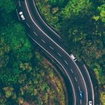 Road Map - Aerial View of Road in the Middle of Trees