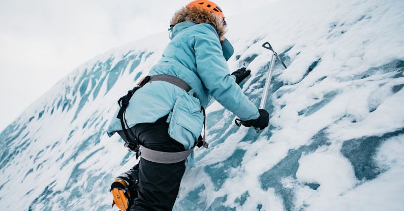 Climbing Gear - Mountaineer Climbing Ice Wall