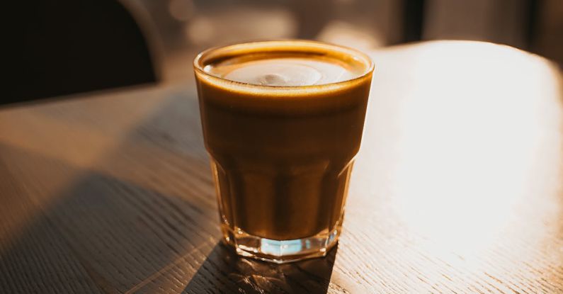 Coffee Sunrise - Close-Up Photo of Coffee On Table